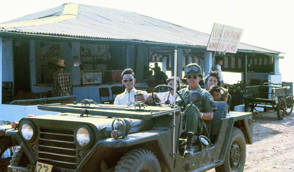 ARVN Sgt Duc and wife, in jeep at Windy Hill Cafe, with MSgt Summerfield-1969: 09