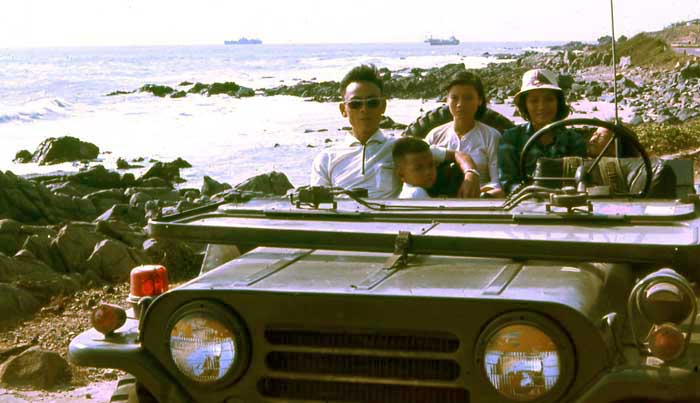 ARVN Sgt Duc, wife, and daughter, in jeep at beach with MSgt Summerfield-1969: 10