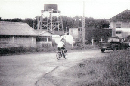 Scenes around the base. Bicycle girl checking us out.