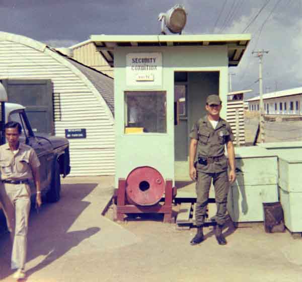 6. Bien Hoa AB Gate Post: Security Condition White. Photo by: Ernest (Coco) Govea. 1968-1969.