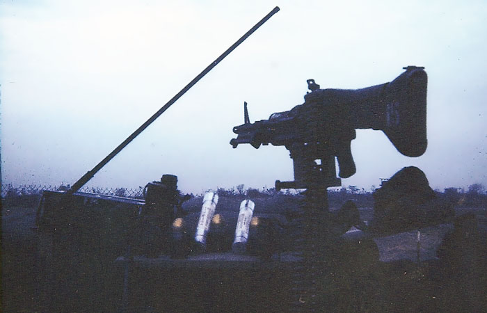 25. Biên Hòa Air Base: Michael Pollock, Armament at bunker PRC radio,binoculars,40MM granades, Slap Flares M-60 and M-79 granade launcher. Always had M-16, sidearm, and motorola. Landline hardly ever worked. 1968-1969. Photo by: Michael Pollock, BH, 3rd SPS. 1968-1969.