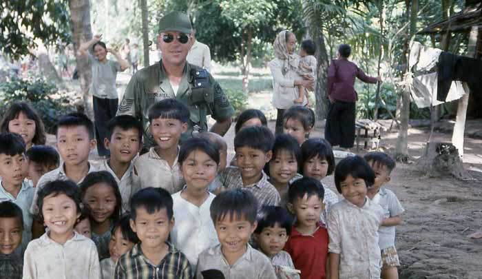 Bien Thuy Air Base. Grandmasan corraled one. Mamasan gets to comb her hair. GreatGrannysan is beatin' feet. And I get to play with the village-kids. I Win! MSgt Summerfield: 14