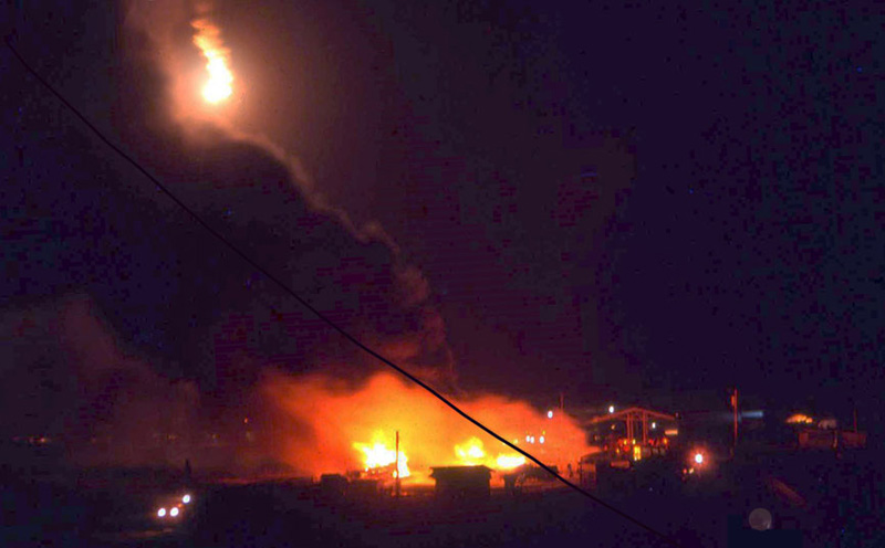 Bien Thuy Air Base mortar-attack strikes POL tanks, pump canopy, and barracks area. QRT searches for intruders or casualties. MSgt Summerfield, 1968: 24