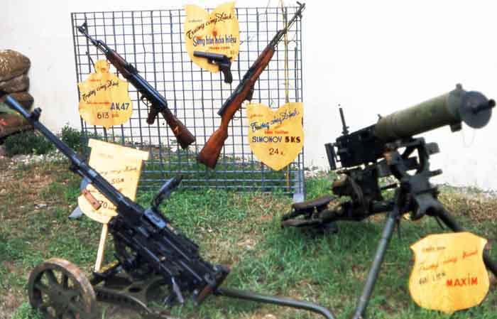 Bien Thuy Air Base, Captured VC weapons and mortars. MSgt Summerfield, 1968: 03