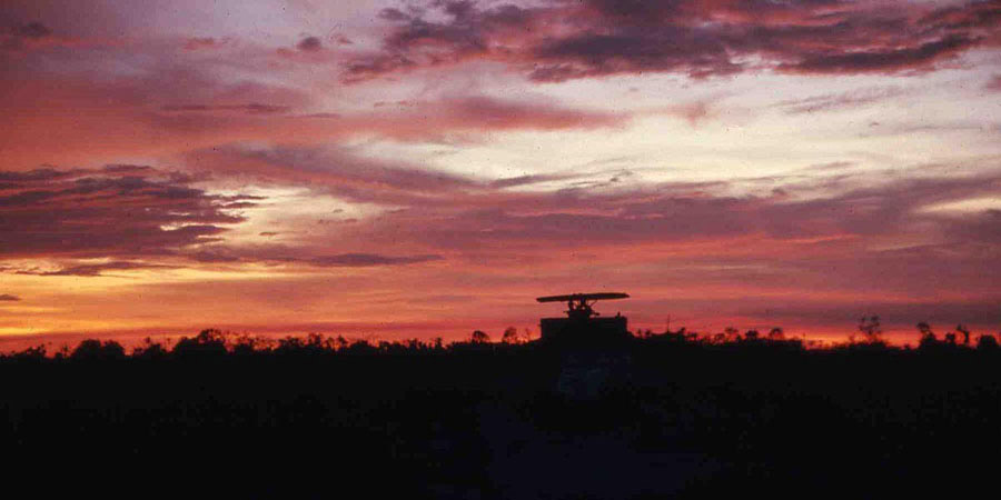 Bien Thuy Air Base, perimeter, SPS bunker with M60 silhouette at sunset. MSgt Summerfield: 04