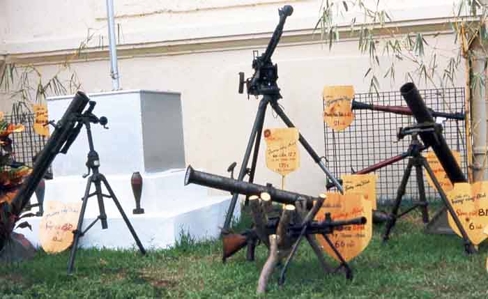 Bien Thuy Air Base, Captured VC weapons and mortars. MSgt Summerfield, 1968: 04