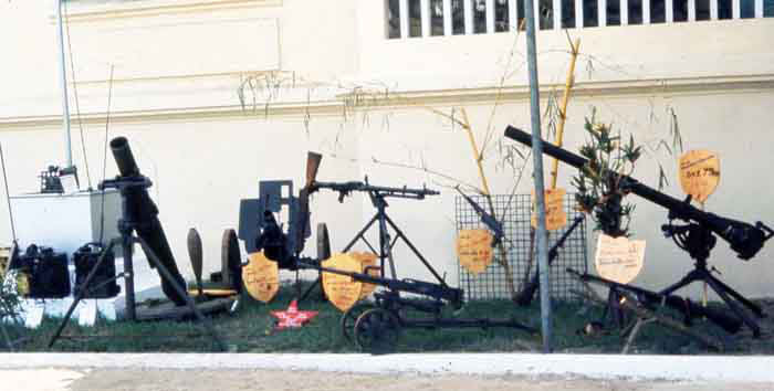 Bien Thuy Air Base, Captured VC weapons and mortars. MSgt Summerfield, 1968: 08