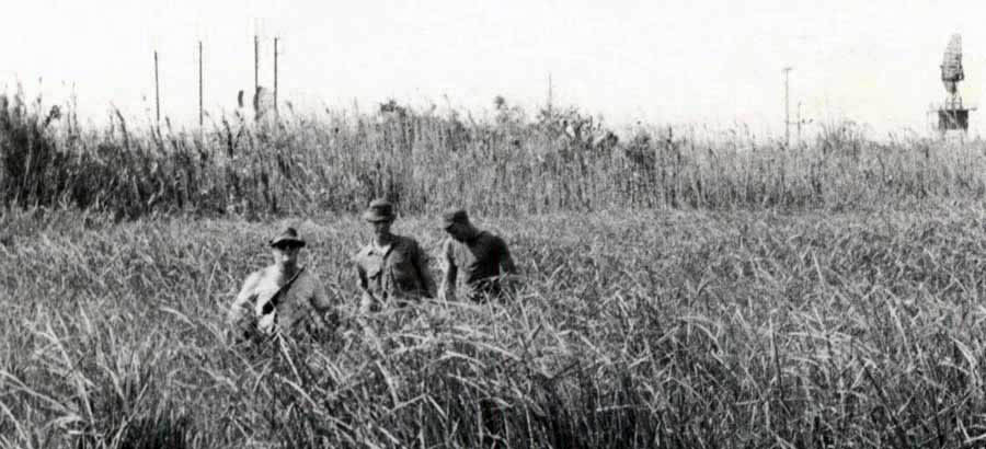 26) Outside the perimeter wire (claymore mines and all). We would take 5-gallon tanks and pour gas on an area and slap a flare into the bush. Not a pleasant job in 103 degree temp. 