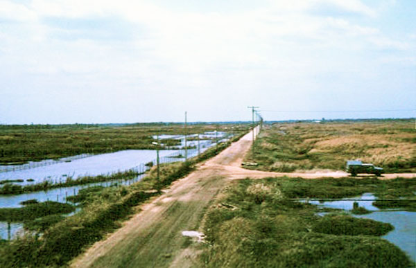 028: Bình Thủy AB, perimeter road. Photo by: Dr. Mel Hecker, 1968 