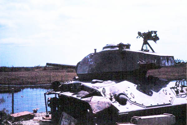 034: Bình Thủy AB, perimeter tank. Photo by: Dr. Mel Hecker, 1968 