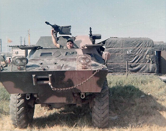 13. BT Air Base: Jaime driving a V100. Photo by Jaime Lleras. 1970.