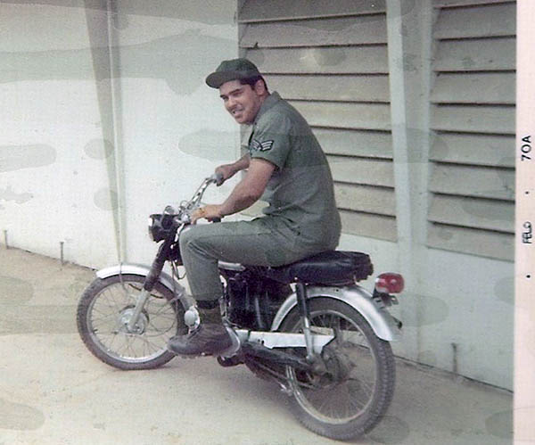 23. BT Air Base: Jaime riding a scooter. Photo by Jaime Lleras. 1970.
