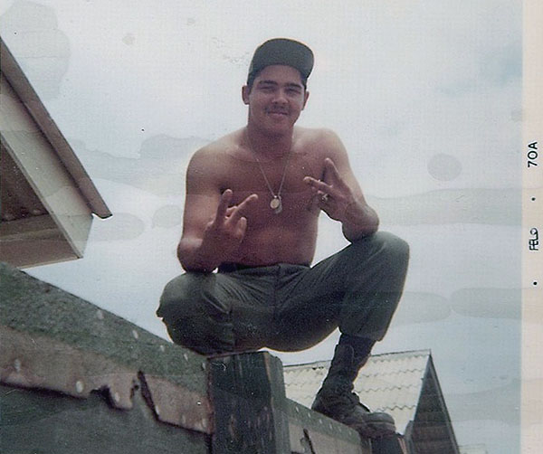 25. BT Air Base: Jaime on top of bunker. Photo by Jaime Lleras. 1970.