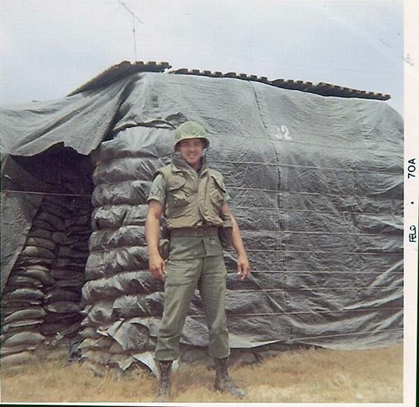 26. BT Air Base: Jaime modeling war gear. Photo by Jaime Lleras. 1970.