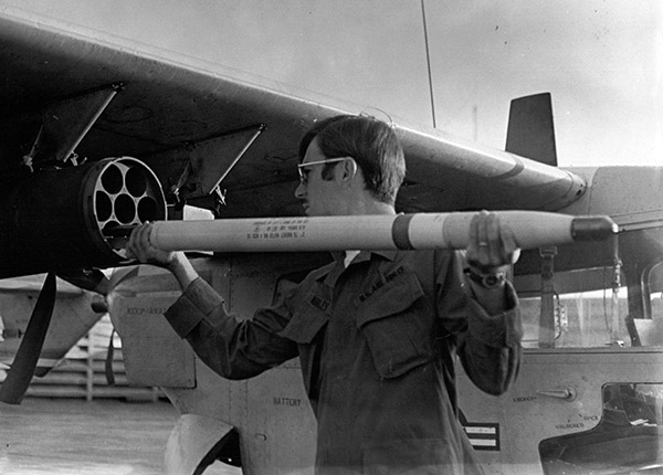 9. Bình Thủy AB, flight line: Dan Manley, loading-rockets. 1970-1971.