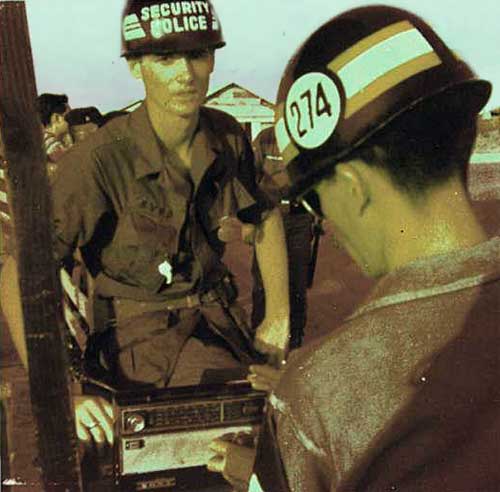 14. A1/C Byrd & QC guard at main gate 1968.