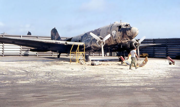 Bien Thuy Air Base flight line revetment. C47 fire extinguished and bird saved. MSgt Summerfield: 31