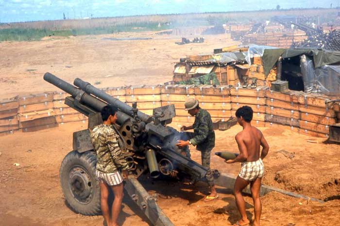 ARVN 105mm Howitzer crew, firing H&I. MSgt Summerfield, 1968: 30