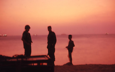 Bien Thuy, sunset at South China Sea. Freighter ships on horizon. MSgt Summerfield: 20