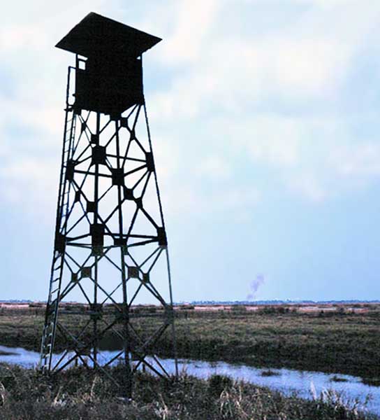 3. Bình Thủy Air Base: Perimeter Tower. 1968. Composite image of photos 1 & 2 above (Don Poss) Photo by: Mel Hecker, LM 72, DN, 366th SPS; DET CB; DH, 1/620th TCS; BT, 632nd SPS. 1967-1969.