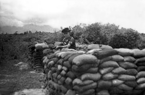 12. Đà Nẵng AB, VC-NVA POW Camp near main gate. QC Tower in camp. Water Tower in background. 1966-1967. Photo by: Ron Westering, LM 431, DN, 366th SPS; DET MM, 1/366th SPS. 1966-1967.