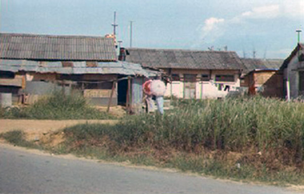 12. Đà Nẵng Air Base: ARVN Vietnamese housing across from SPS hooches. Photo by Alan Ellison, 1968.