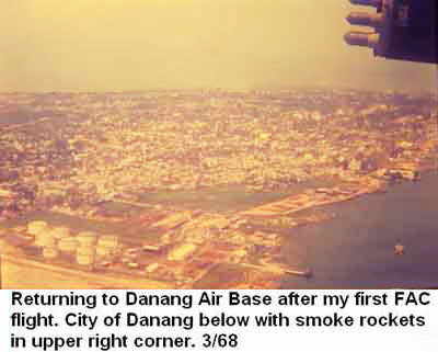 Đà Nẵng Air Base, SVN: USAF Returning to Đà Nẵng Air Base after my first FAC flight. City of Đà Nẵng below (photo) with smoke rockets in upper right of photo.