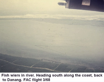 Đà Nẵng Air Base, SVN: USAF  FAC flight overflies giant fishing nets (look like pointed arrows in water), heading south along coast back to Đà Nẵng Air Base. Mar. 1968. © 2011 by Bradford K. Deal