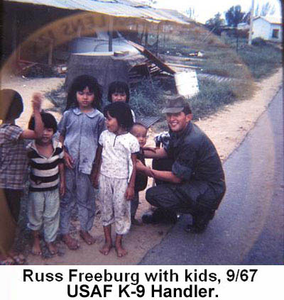 Russ Freeburg with Vietnamese Kids, Đà Nẵng. K-9 Handler Sept 1967.