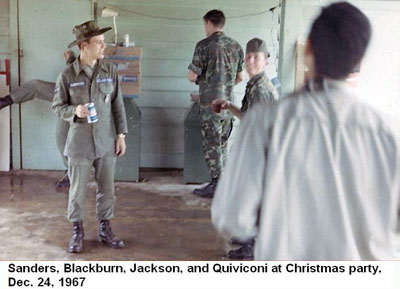 Đà Nẵng Air Base, SVN: USAF Sanders, Blackburn, Jackson, and Quiviconi at Christmas party, Dec. 24, 1967.