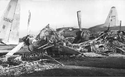 Da Nang Air Base: C-130 aircraft parked in revetments S/E revetments of parking ramp, were destroyed in Sapper Attack, 1 July 1965.