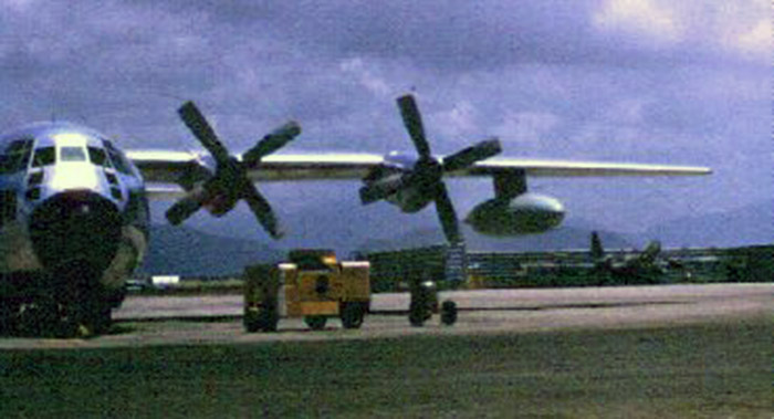 Da Nang Air Base: C-130 aircraft, with B-57 Bomber parked in revetment.