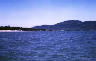 China Beach, Đà Nẵng, Vietnam. In places you could walk out 100 yards and only be waist deep in the 80 degrees water.