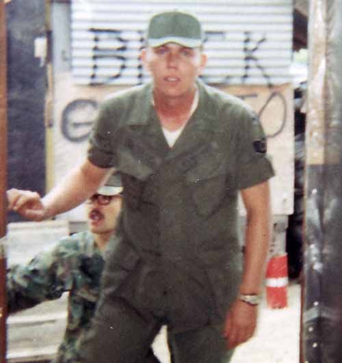 Photo #13 (Nha Trang): This is a shot of me in my cube in the new barracks. I often thought about sending this photo to Hills Bros Coffee for an ad but never did.