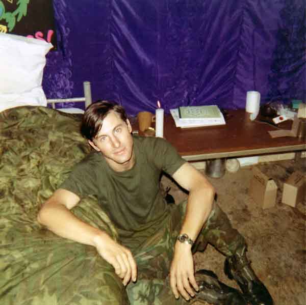 Photo #13 (Nha Trang): This is a shot of me in my cube in the new barracks. I often thought about sending this photo to Hills Bros Coffee for an ad but never did.