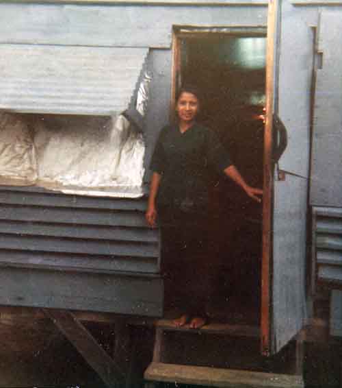 Photo #13 (Nha Trang): This is a shot of me in my cube in the new barracks. I often thought about sending this photo to Hills Bros Coffee for an ad but never did.