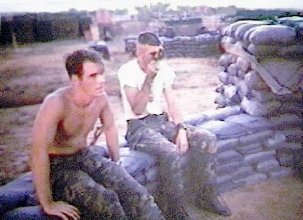 [6] Sgt Doug Lilly and Russ Harrell laying in the baseplate and the aiming-stakes at the 81mm Mortar Pit Đà Nẵng AB, RVN 1969. 
