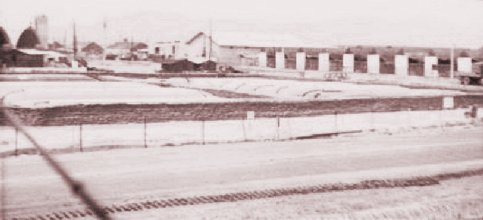 [41] Looking toward Gunfighter Village, from the Mortar Site. The center building took a 122 Rocket just prior to this pic being taken.