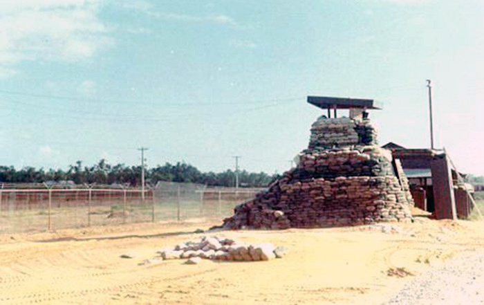1. Đà Nẵng Air Base: SP Tower-Bunker post on the Perimeter, by Camp Đà Nẵng, which later became known as Gunfighter Village. Spooky used to have nightly workouts in the treeline in the background of this picture. Photo by Vernon Hodge, 1968.