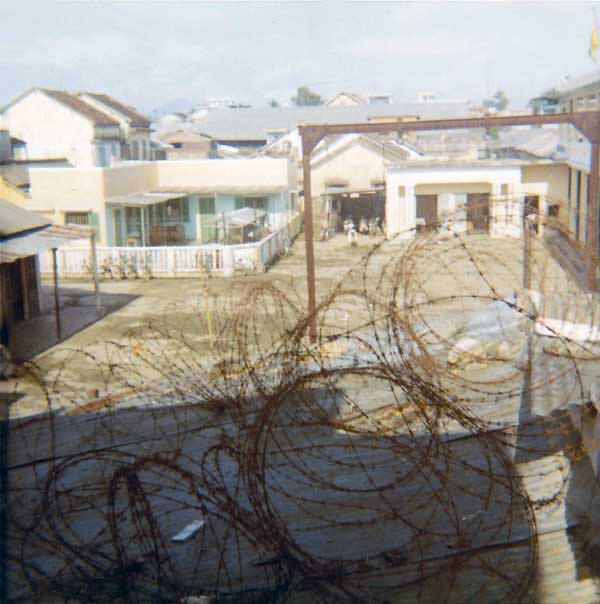 8. Đà Nẵng Air Base: 366th SPS, Looking over fence in to Dog Patch village. Photo by Konrad F. Kottke, 1971-1972.