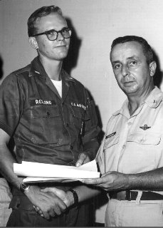 Da Nang Air Base: Base Commander, Colonel Eisenbrown, shakes then 1st LT Fred Reiling's hand. Reiling retired as a LTC (USAF).