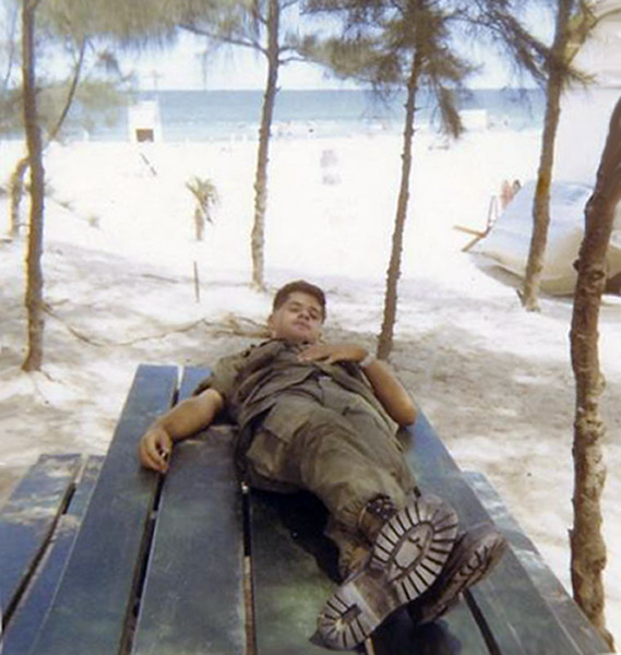 14. Đà Nẵng AB, 366th SPS. A day at China Beach. Picnic table under palm tress... and a snooze. Photo by: Ralph Manganiello Jr. 1966-1967.