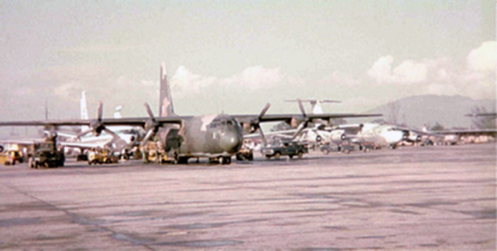 23. East flight line. C-130 and various aircraft parking.