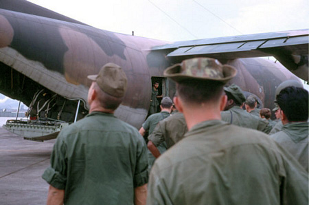 25. flight line. Boarding C-121.