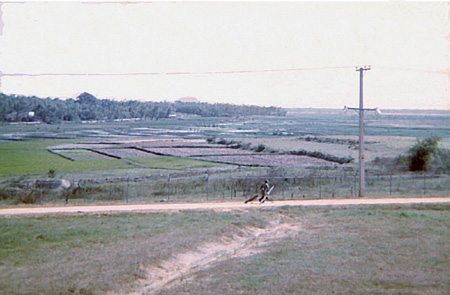 32. Đà Nẵng AB, East perimeter Road. K-9 and handler.