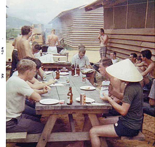 14. Đà Nẵng AB, 366th SPS, K-9: K-9 handlers enjoy an off-duty BBQ. Photo by: Lee Miller, Nov 1966.