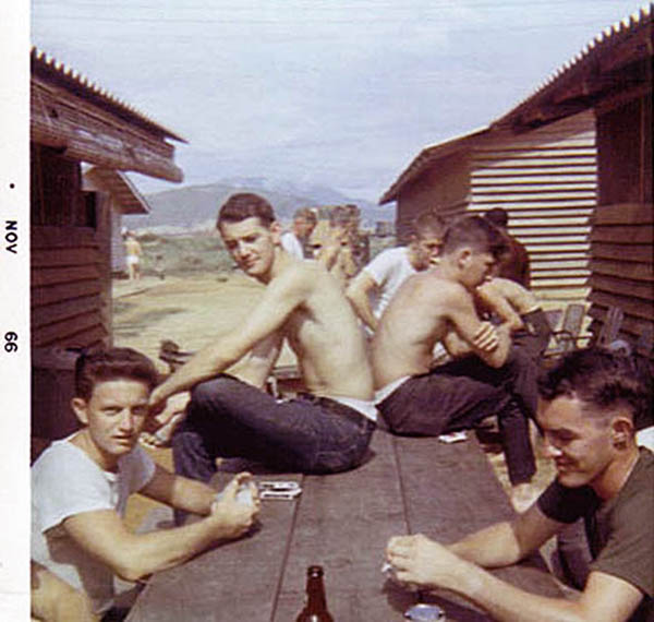 15. Đà Nẵng AB, 366th SPS, K-9: K-9 handlers enjoy an off-duty BBQ. Photo by: Lee Miller, Nov 1966.