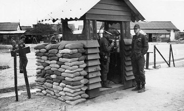 2. Đà Nẵng Air Base: 366th SPS hut compound Access Gate. Across the street, ARVN housing. Photo by Ronald A. Perez, 1967.