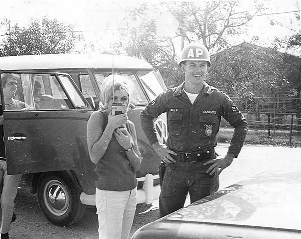 4. Đà Nẵng Air Base: 366th SPS. Actress and singer Nancy Sinatra poses with A1C Mejer. Photo by Ronald A. Perez, 1967.