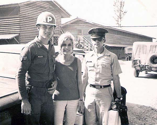 5. Đà Nẵng Air Base: 366th SPS. Actress and singer Nancy Sinatra and LT escort officer, pose with A1C Mejer. Photo by Ronald A. Perez, 1967.